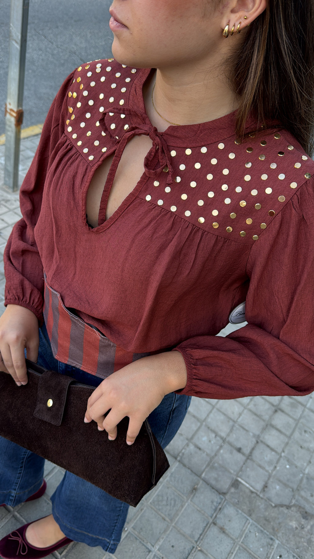 Blusa tachas Caldera