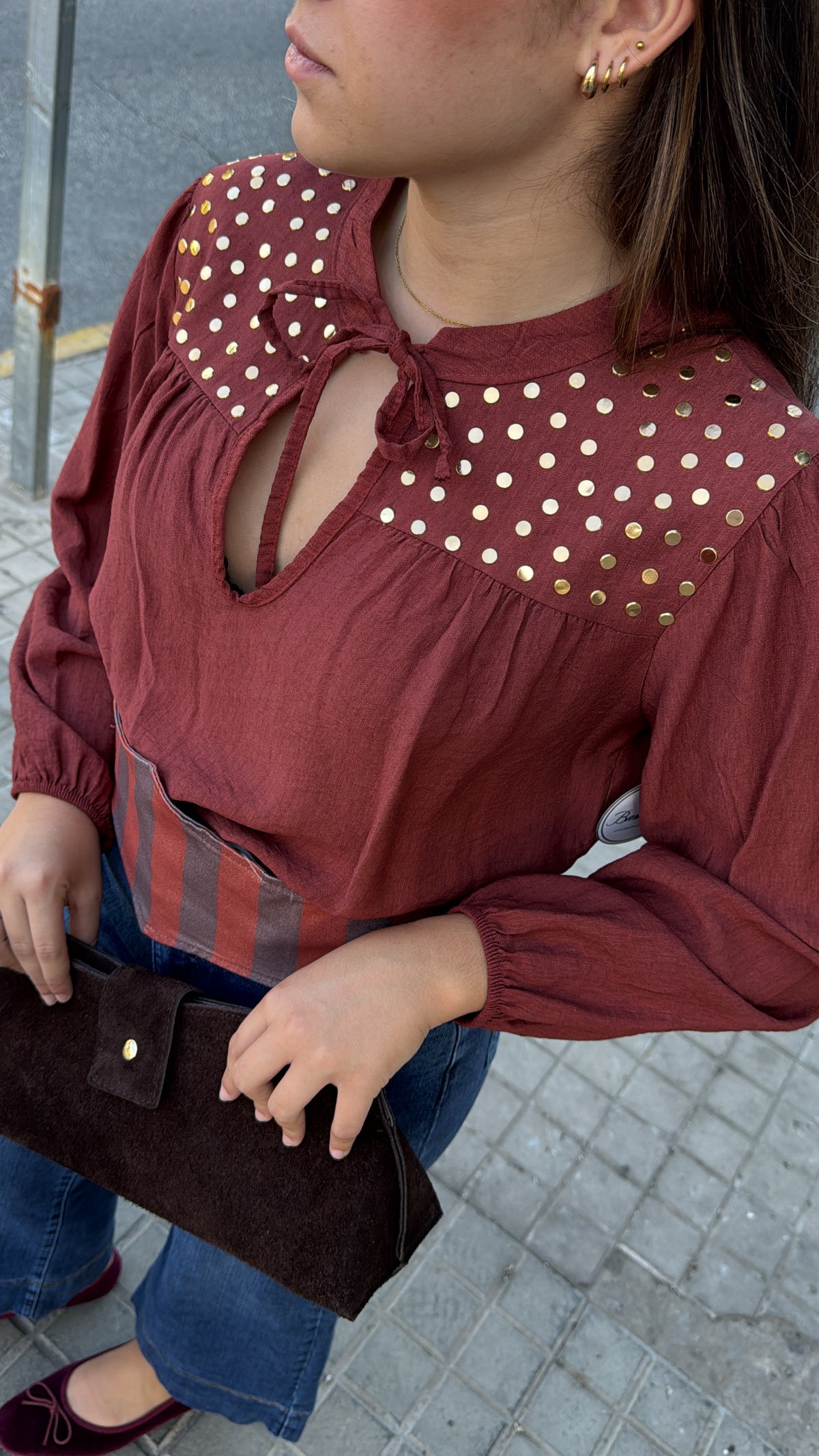 Blusa tachas Caldera