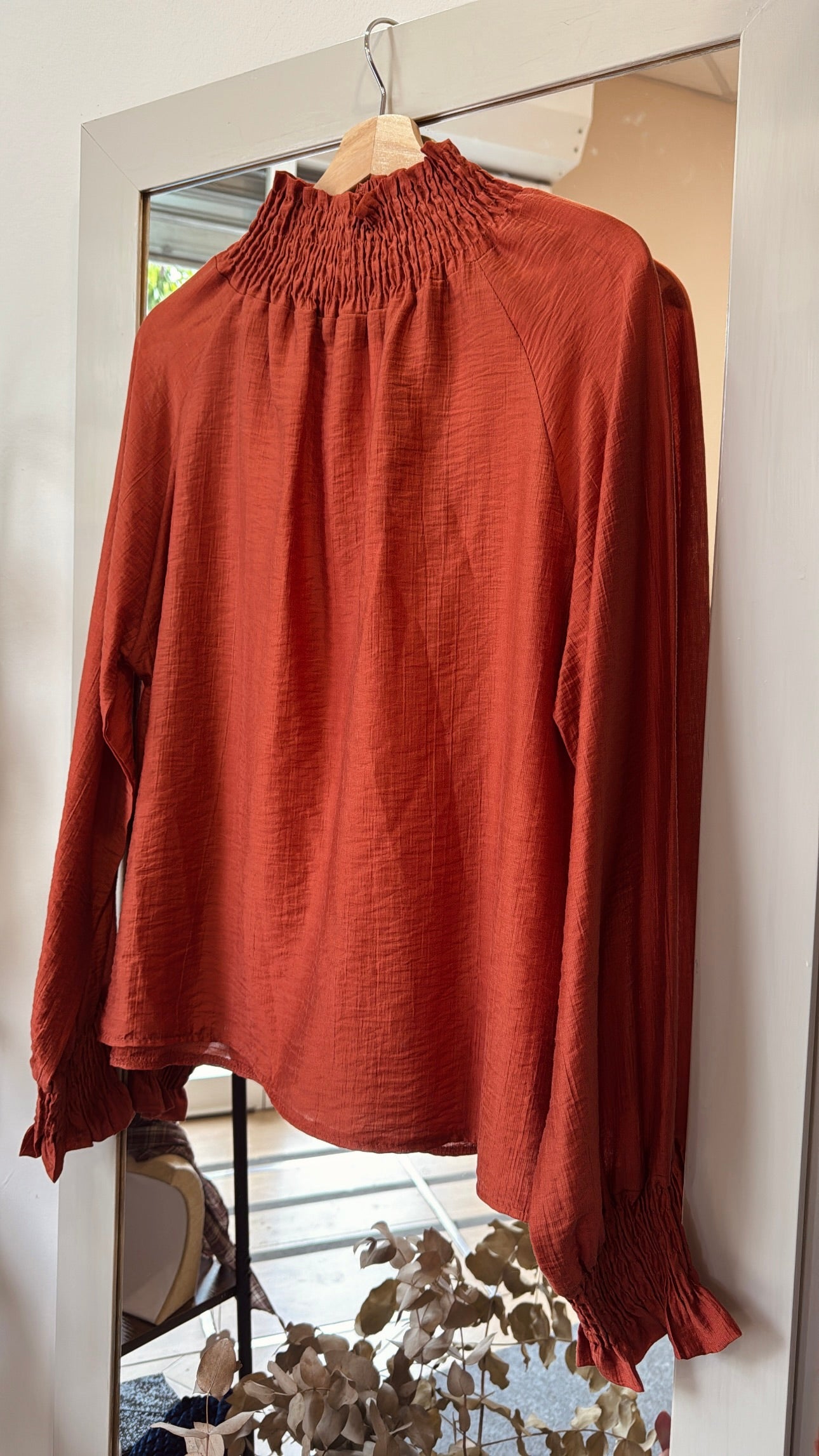 Blusa cuello nido de abeja